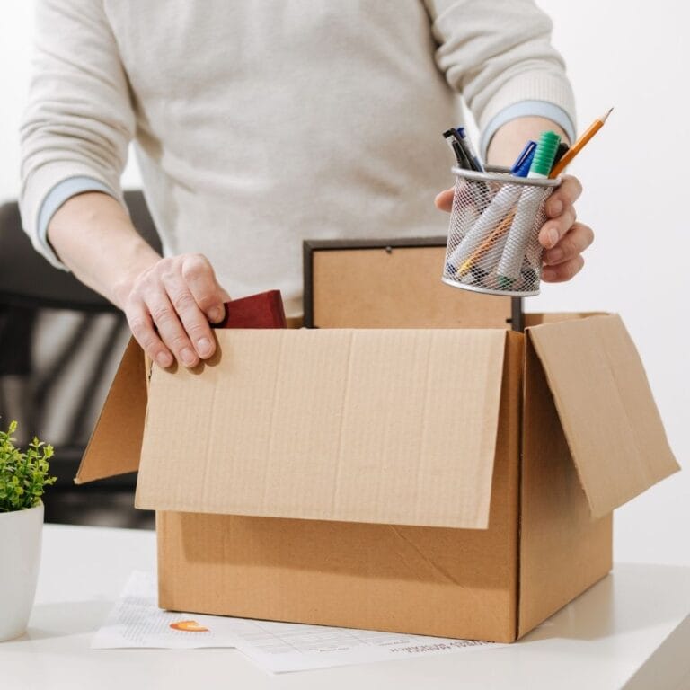 packing desk supplies in box
