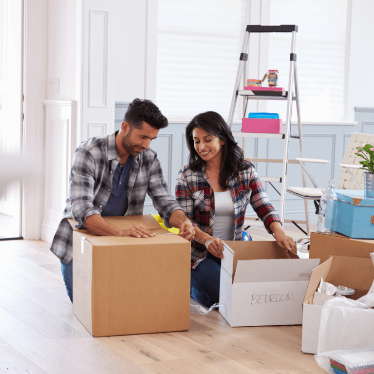 Happy couple packing